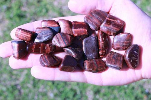 Red Tigers Eye Tumbled Stone-Cosmic Cuts