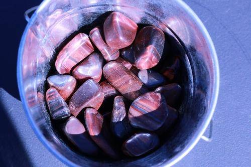 Red Tigers Eye Tumbled Stone-Cosmic Cuts