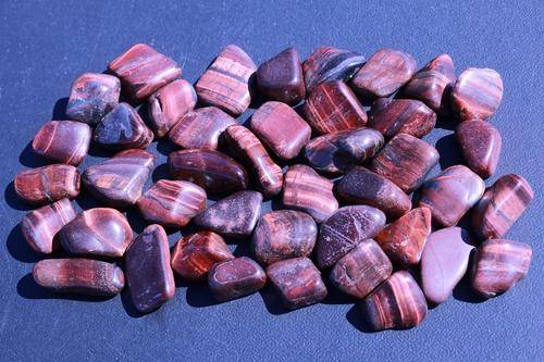 Red Tigers Eye Tumbled Stone-Cosmic Cuts